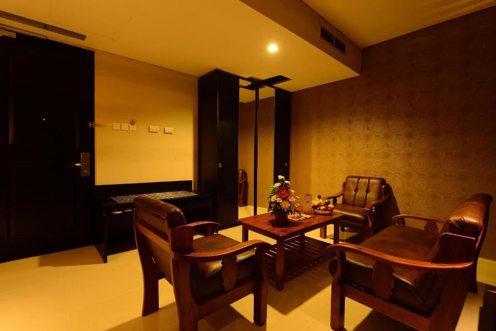 Emilia Hotel By Amazing - Palembang Room photo